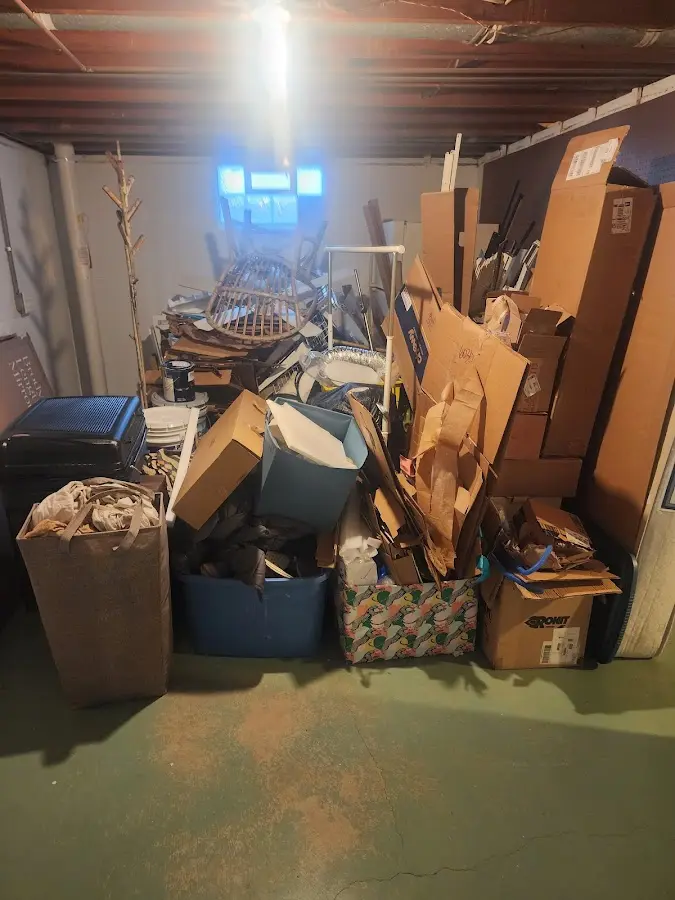 Roll-off dumpster container at job site for Concrete Dumpster Rental in Champion